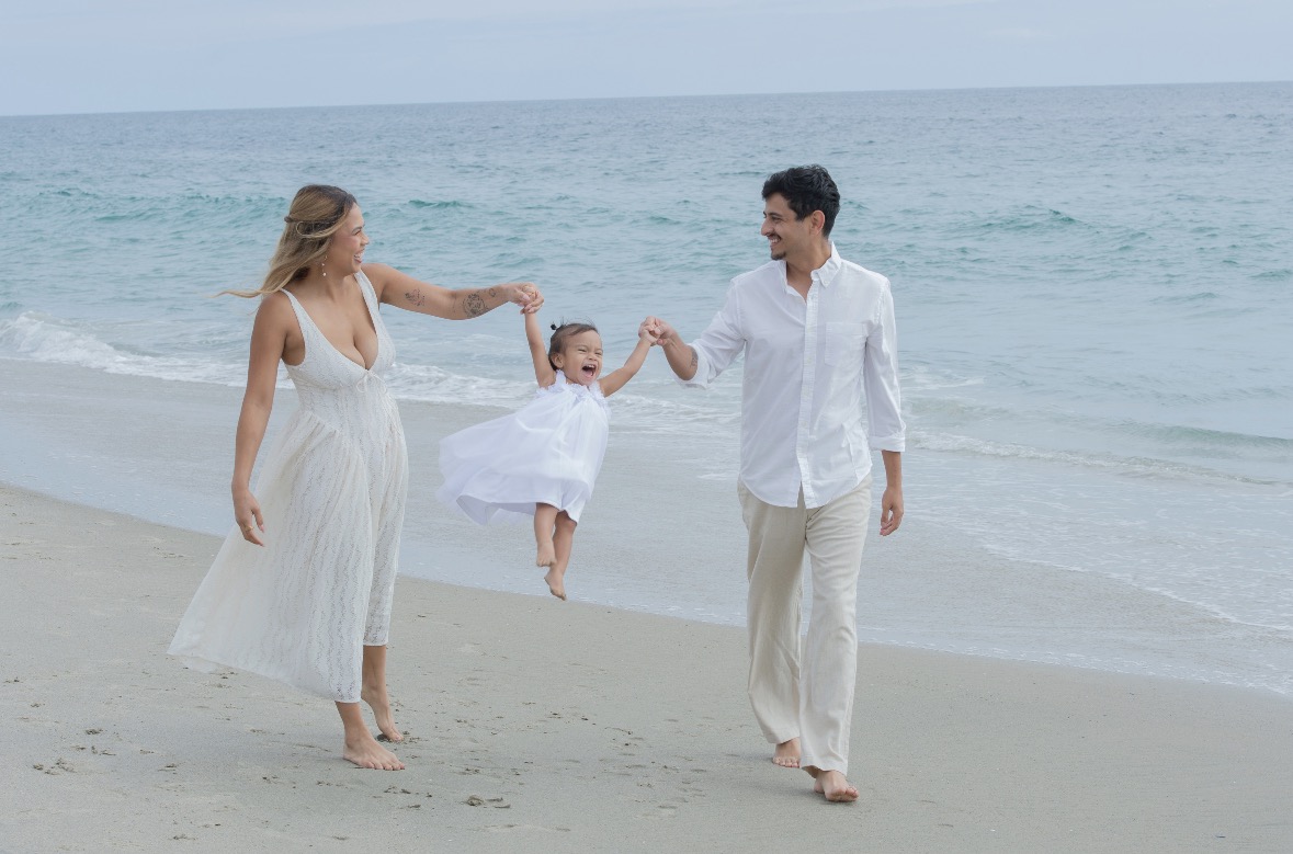 Family walking along the beach