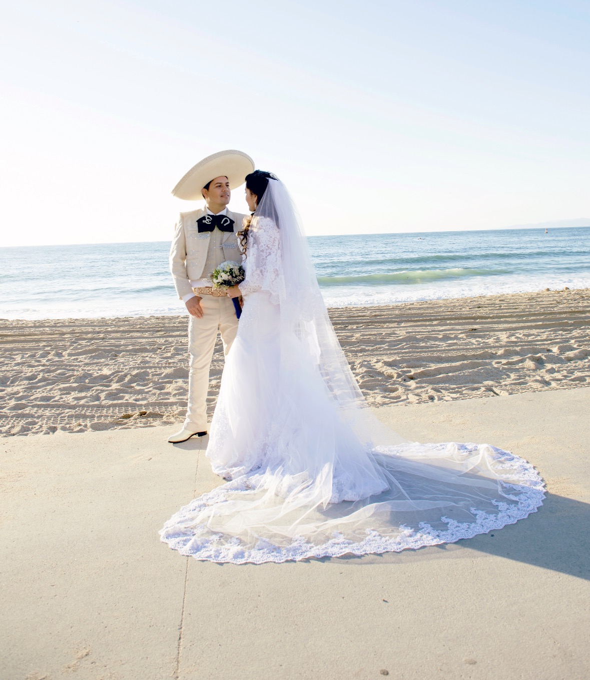 Bride's lace train on the boardwalk